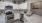 a kitchen with white cabinets